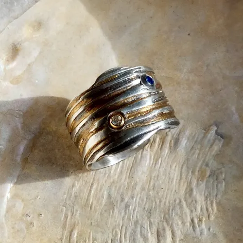 Avanti - Aparte zilveren ring met diamant, saffier en goud