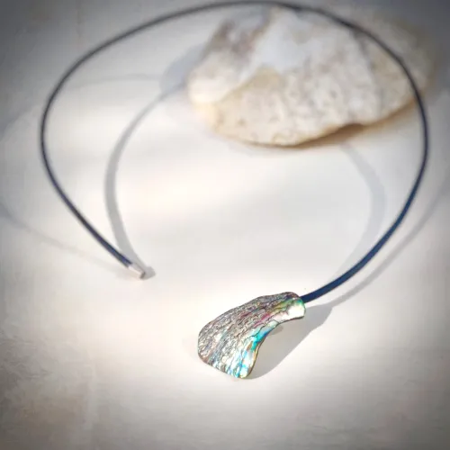 Elegante - Paua Shell aan spang
