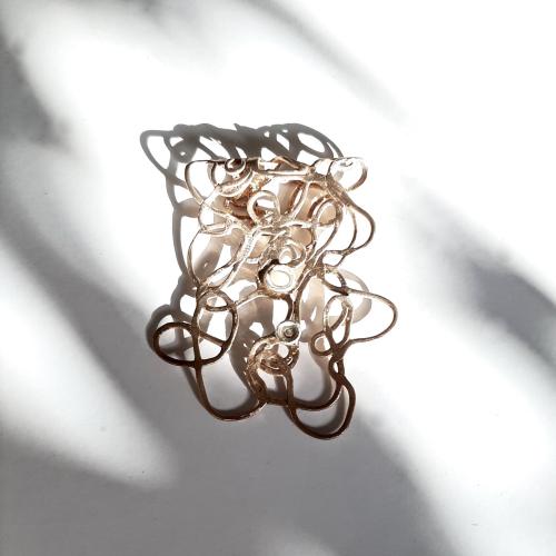 Ramillas - goudkleurige design broche