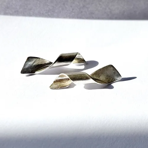 Ricciolo - Zilveren design oorbellen