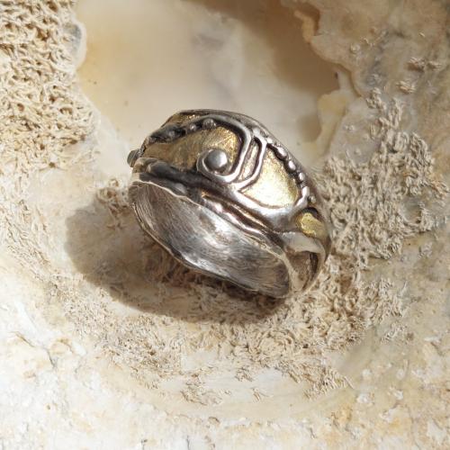 Robusto - Unieke zilveren ring met goud