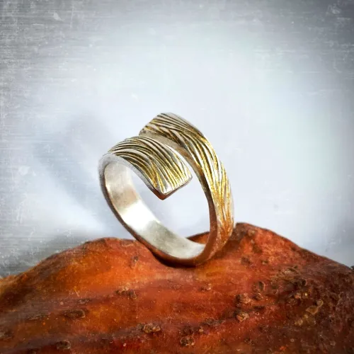 Salto Piu - Elegante zilveren ring met 24 krt goud