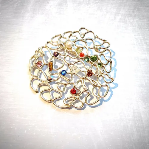 Siguna - Zilveren filigrain broche
