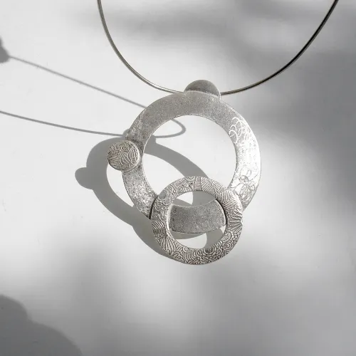 Vueltas - Zilveren design collier